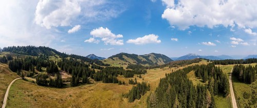 Drone shot of the Illingeralm with a view of the Pillsteinhöhe and Zwölferhorn, Osterhorn group,
