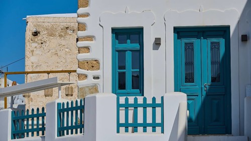 White building with turquoise door and traditional design, Chora, Astypalea, Dodecanese, Greek
