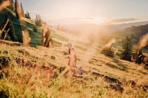 Summer trail running and hiking in the Alps on the Riedberg Pass between Obermaiselstein and