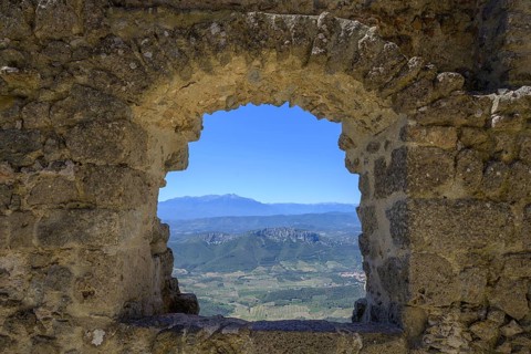 View from a stone arch, Quéribus Cathar castle, Cucugnan, Département Aude, France, Europe