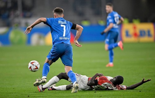 Duel, action Sael Kumbedi Olympique Lyon Lyonnais OL (20) on the ground against Tom Bischof TSG