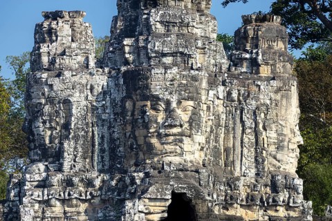 Giant stone-carved faces of the Bodhisattva Lokeshvara, also known as Avalokiteshvara, Angkor Thom