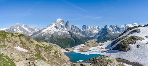 Mountain landscape with mountain lake Lac Blanc, mountain peaks, Aiguille Verte, Grandes Jorasses,