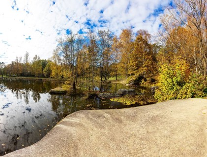 Fish pond with granite rocks in the Blockheide nature park Park near Gmünd, Waldviertel, Lower