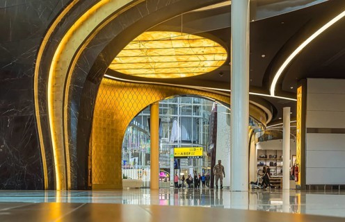 Abu Dhabi Airport, Zayed International Airport with passengers. Duty free shop. The new Terminal A