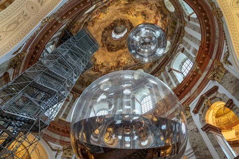 Aerocene art installation with giant reflecting sphere in the baroque Karlskirche church in Vienna,