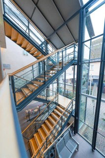 Modern, steel staircase in an urban building with large glass walls, Nagold Town Hall, Black