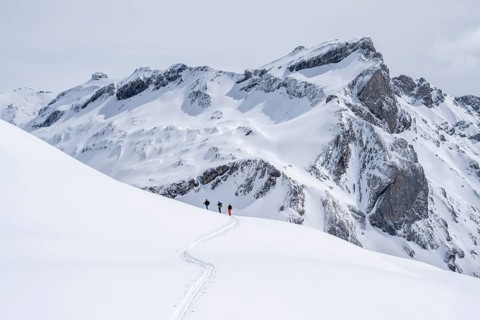 Three lonely ski tourers, winter in the Bernese Alps, Bernese Oberland, Switzerland, Europe