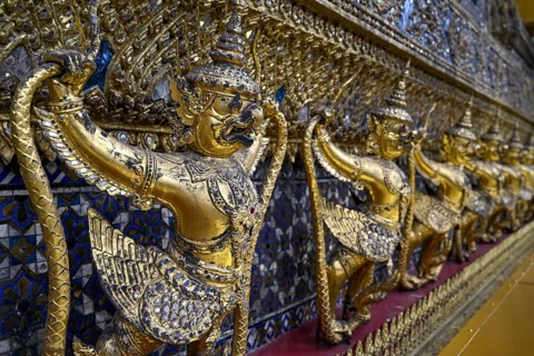 Golden sculptures of Garuda and Naga, Wat Phra Kaew, Temple of the Emerald Buddha, Bangkok,