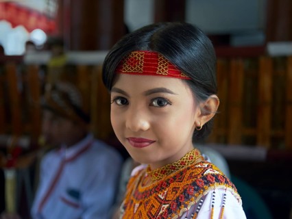 Toraja girl in traditional colourful clothing, portrait, Tana Toraja, Rantepao, Sulawesi,