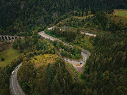 Winding road through dense forest in serpentines, Ravenna Gorge, Black Forest, Germany, Europe