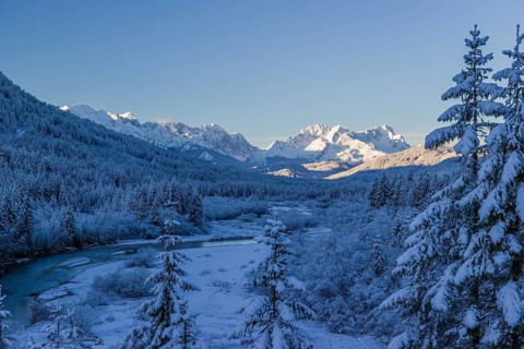 Isar valley in winter at temperatures of minus 18 degrees Celsius. Snow covered landscape with the