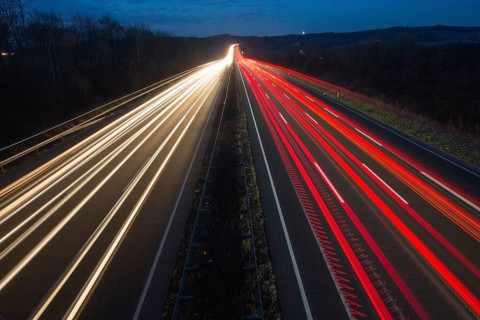 A7 Motorway, Autobahn, beside Kassel at night with light trails from the traffic headlights and