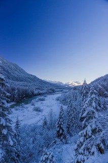 Isar valley in winter at temperatures of minus 18 degrees Celsius. Snow covered landscape with the