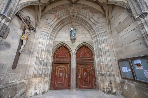 Male portal in Baroque style, late Gothic hall church of St George, Dinkelsbühl, Bavaria, Germany,
