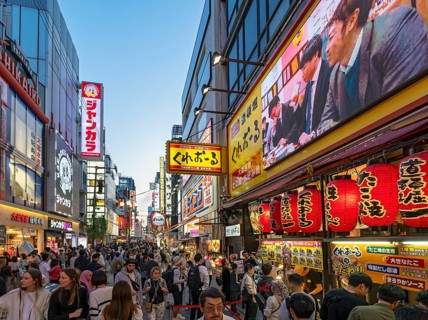 Night-time street with neon lights and illuminated signboards, Dotonbori district, Osaka, Japan,