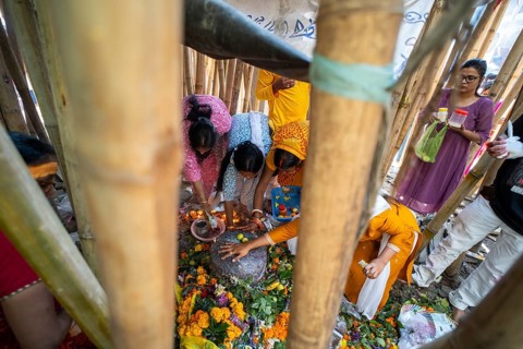 Devotees offer prayers to a Shiva linga on the occasion of Maha Shivaratri, on February 26, 2025 in