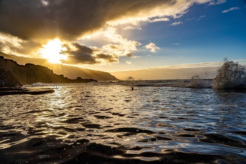 Sunset at the natural swimming pool La Maceta, El Hierro, Canary Islands, Spain, Europe