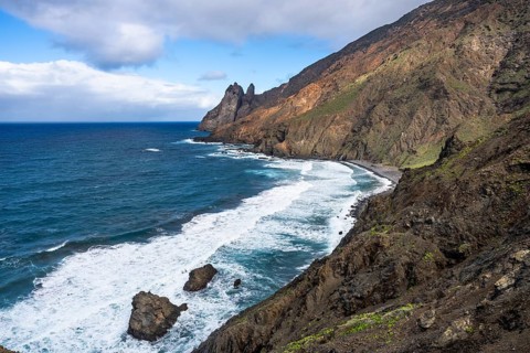 The north-west coast of La Gomera with the Playa de Arguamul beach. Mountains, cliffs and steep