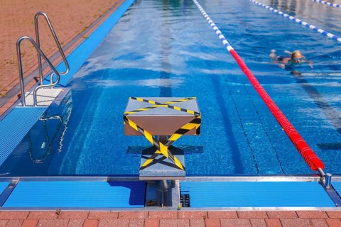 Hagen, North Rhine-Westphalia, Germany - Blocked-off starting block at the edge of the swimming