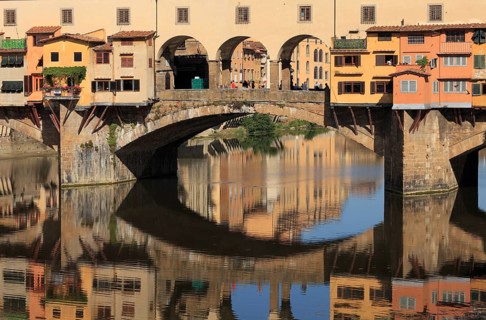 Ponte Vecchio and reflection in the river Arno, Florence, Tuscany, Italy, Europe
