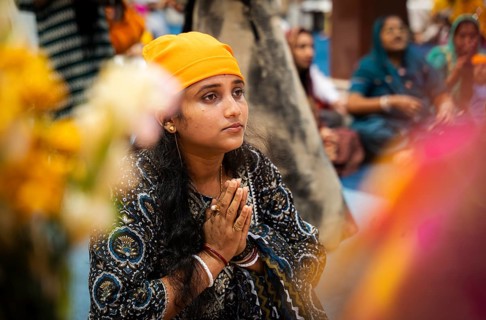Sikh devotees offer prayers at a Gurudwara on the occasion of Guru Nanak Jayanti, in Guwahati,