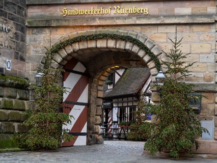 Christmas trees with fairy lights at the Königstor, Handwerkerhof, Nuremberg, Middle Franconia,