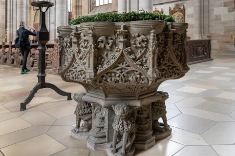 Romanesque baptismal font in the late Gothic hall church of St George, Dinkelsbühl, Bavaria,
