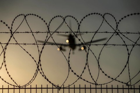 Symbolic image security at the airport, outer fence at Düsseldorf International Airport, steel wire
