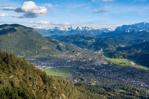 View of Garmisch-Partenkirchen and mountain panorama, hike to Kramerspitz, in autumn, Ammergau
