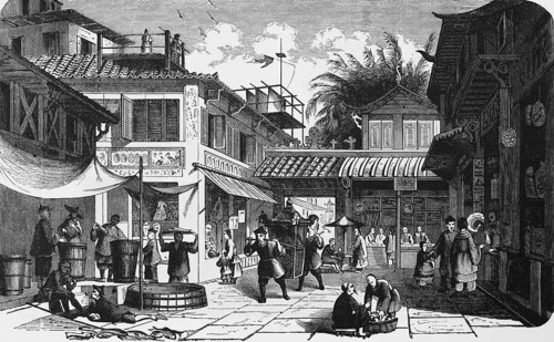 Business street in the city centre of Canton or Guangzhou, shops, trade, people carrying, paved