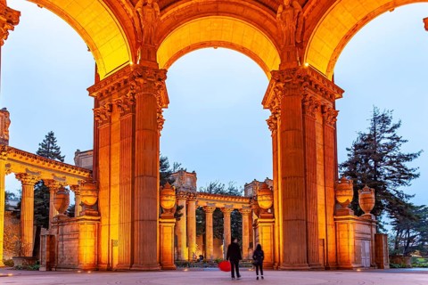The illuminated Palace of Fine Arts in the Marina District in San Francisco at night, California,