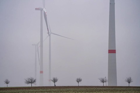 Wind farm in fog, dark doldrums, no wind no direct sunlight, in the Rhenish lignite mining area,