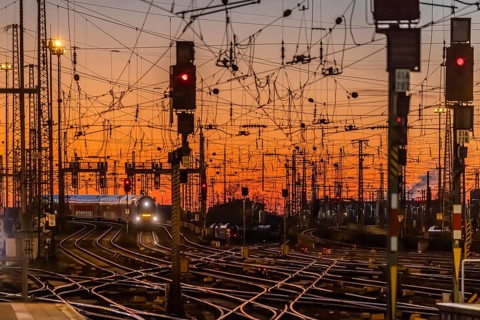 Track apron with trains, rails, points, pylons and signalling systems. Infrastructure at the main