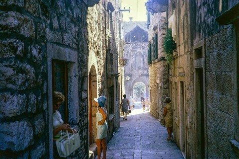 People in narrow alleyway street of the old town, Korcula, Croatia, former Yugoslavia, Europe 1970,
