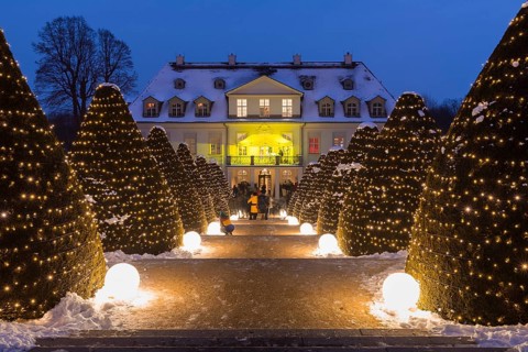 Wackerbarths Winterzauber, Wackerbarth Castle with Christmas lights and snow, Radebeul, Saxony,