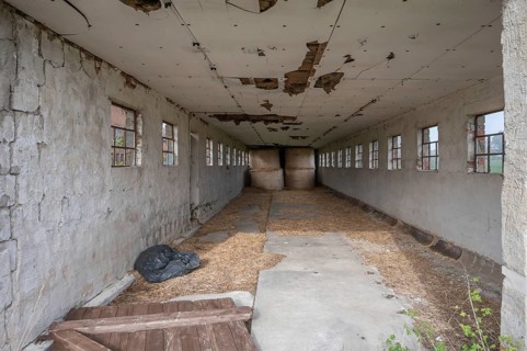 Vacant round bale warehouse of a former LPG of the former GDR, Mecklenburg-Vorpommern, Germany,