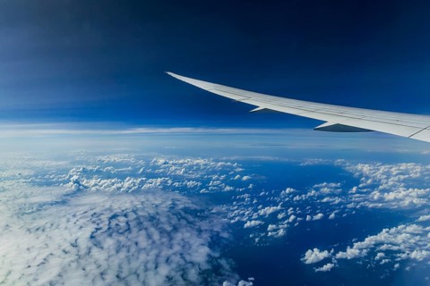 Above the clouds over the Indian Ocean, Bay of Bengal. View from the aircraft window during a