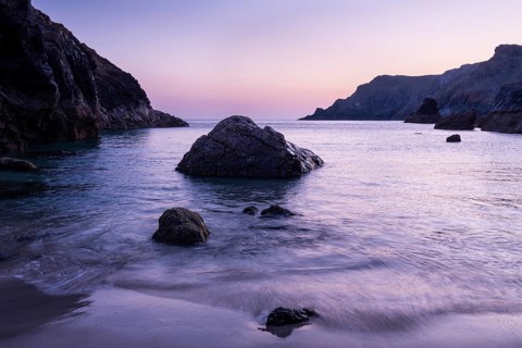 Coast and rocks in Kynance Cove. Evening, blue hour. Kynance Cove, Lizard Peninsula, Cornwall,