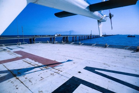 Oil industry in Ras Tanura area, Saudi Arabia, helicopter pad on offshore pier 1979, Asia