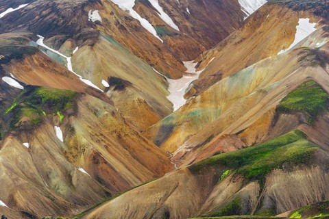 Small river between colourful rhyolite mountains, volcanic landscape, erosion landscape, view from