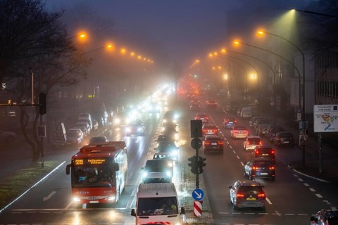 Dense fog, with visibility sometimes less than 100 metres, city centre traffic at rush hour on