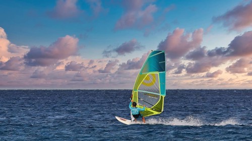 Sky exchanged, windsurfer gliding across the sea under a dramatic sky, windsurfer, Meltemi