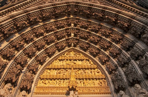 Main portal of the west façade of Cologne Cathedral with statue of the Virgin Mary, baby Jesus and