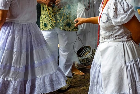 Smoking with burning herbs for spiritual cleansing of people and the common place in Umbanda and