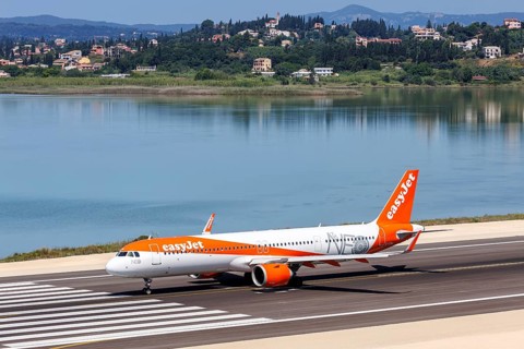 An EasyJet Airbus A321neo aircraft with the registration G-UZMA at Corfu Airport, Greece, Europe