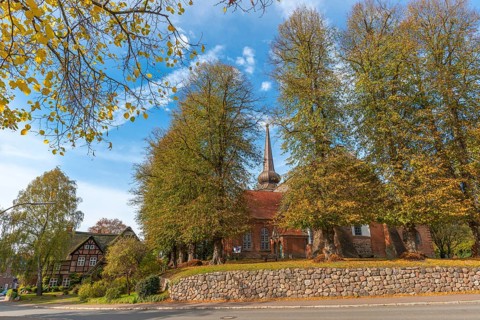 St. Katharinen church and former PLagmann inn, half-timbered house with thatched roof,