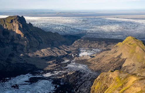 Impressive landscape with mountains and glaciers in the evening light, glacier tongues Huldujökull