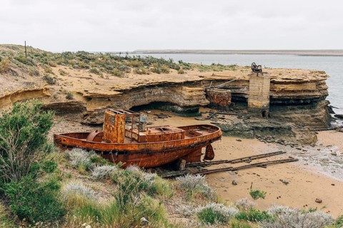 Abandoned supply boat, abandoned Swift factory, The Swift refrigerator in Puerto San Julián, Puerto