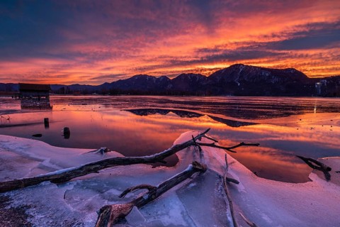Dawn, mountains reflected in lake, clouds, ice, frozen, winter, Lake Kochel, view of Rabenkopf,